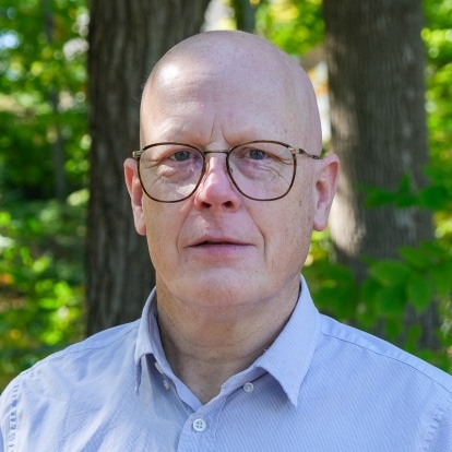 A headshot of Dave Tough.